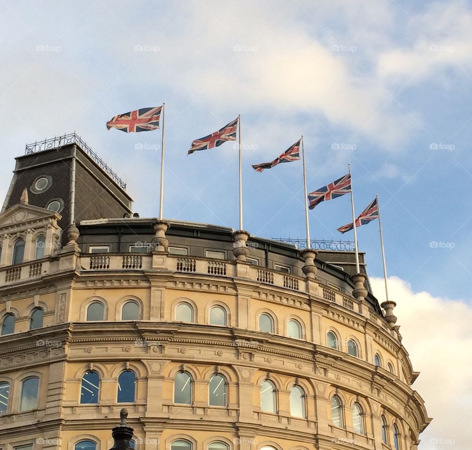 Waving U.K. flags, in London of course!!