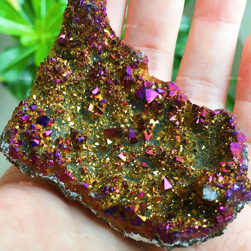 A gold and purple aura quartz druzy cluster rough specimen.