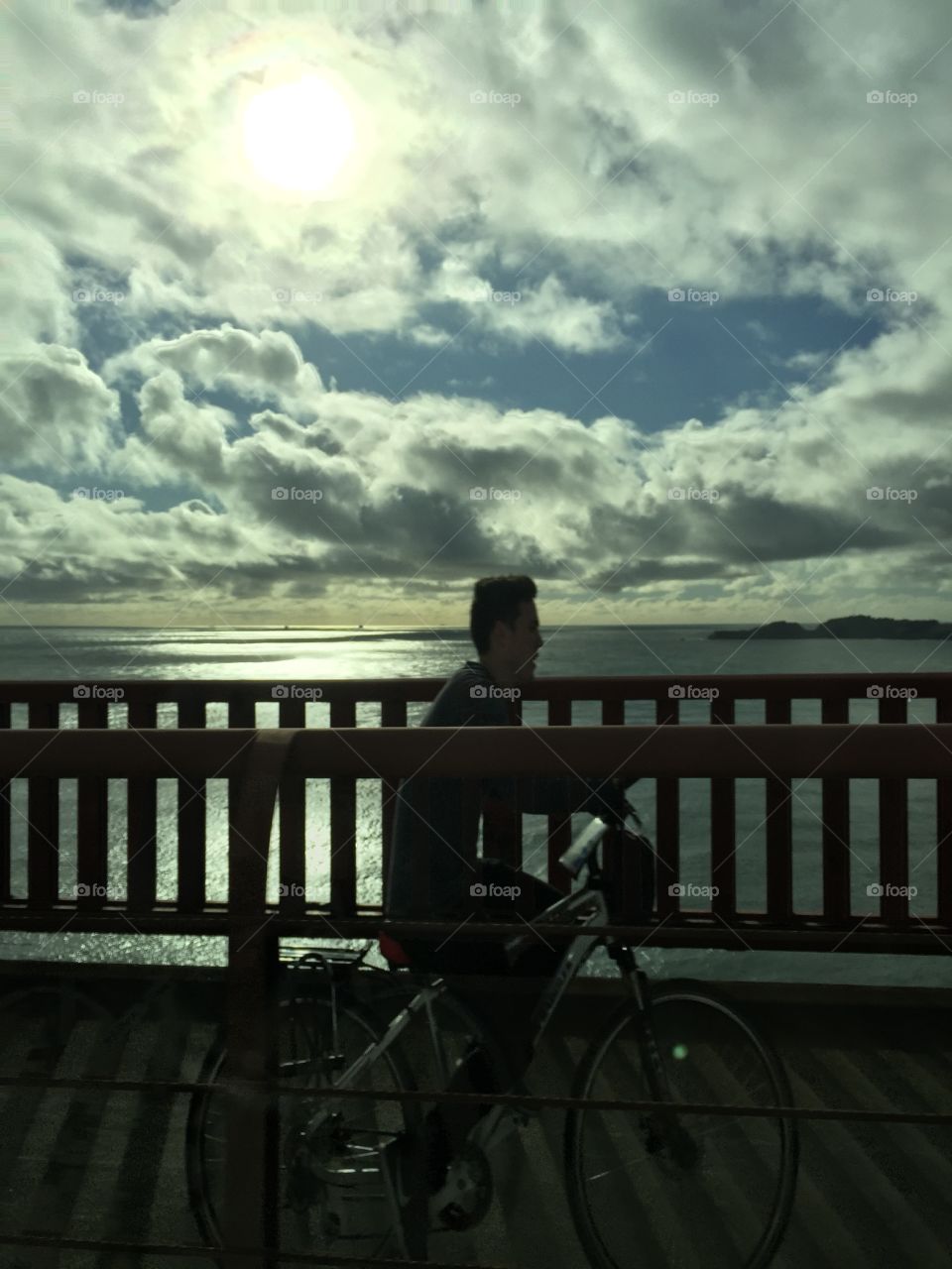 Biking at the Golden Gate Bridge during sunset 