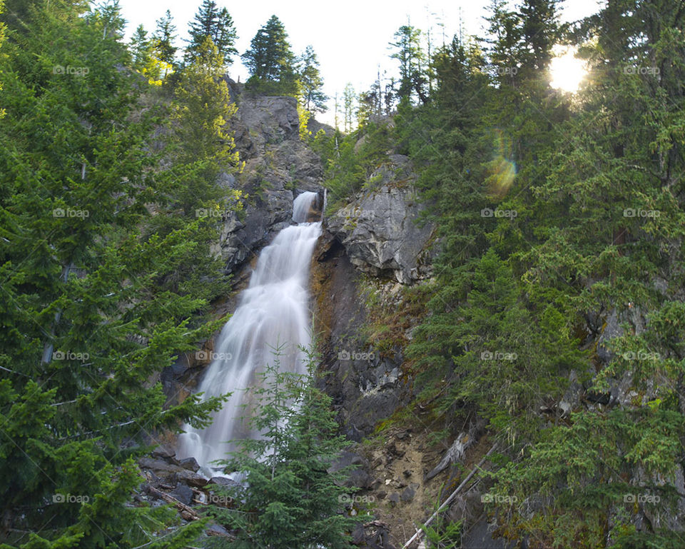 the waterfall cliff in by arizphotog