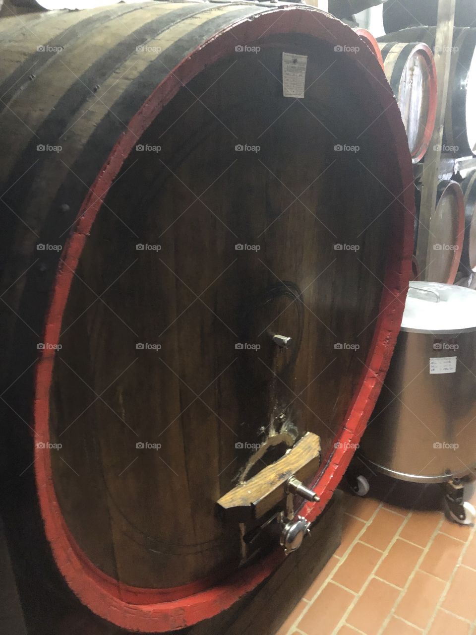 Large brown wood barrel