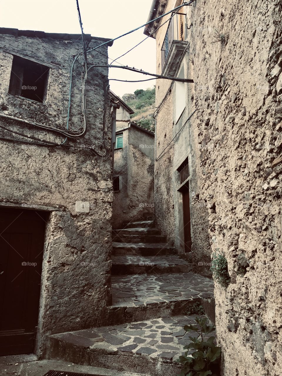 Old and very narrow streets of San Donato di Ninea, the uninhabitated part of the village, Calabria, South Italy 