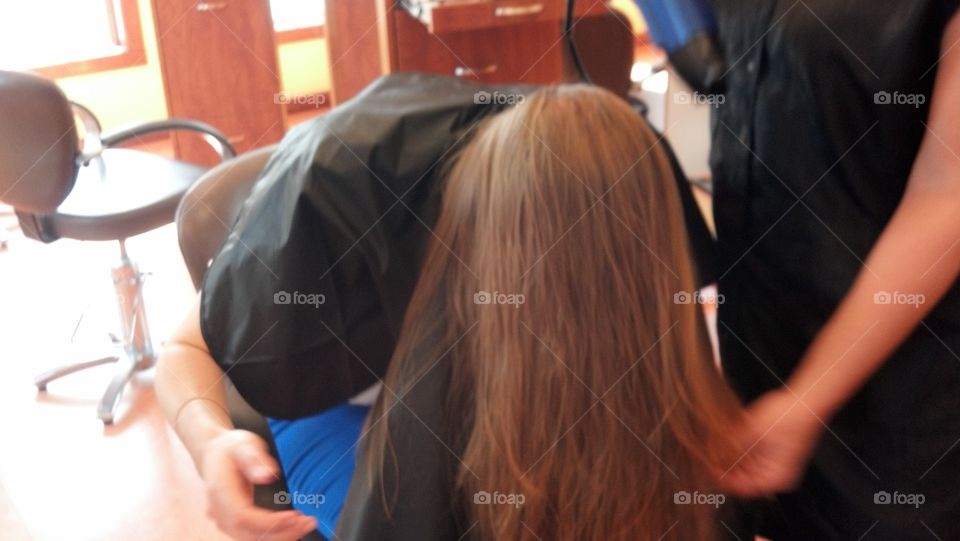 Getting hair done at a salon