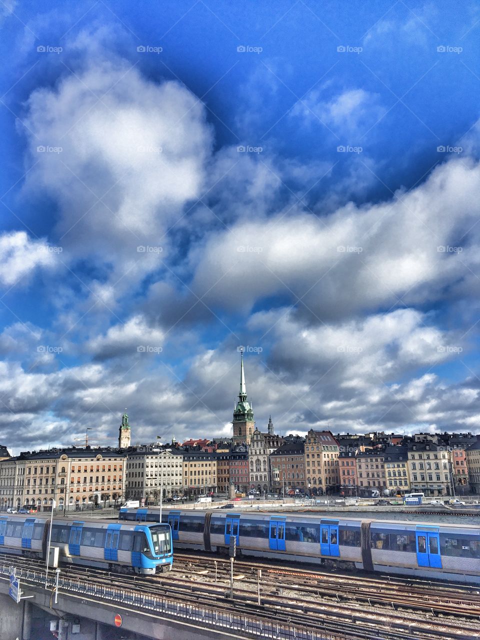 trains and old town stockholm