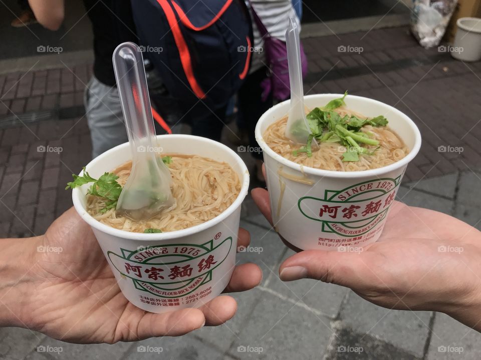 Taiwan rice noodle soup with oysters, noodles in a cup, street food 