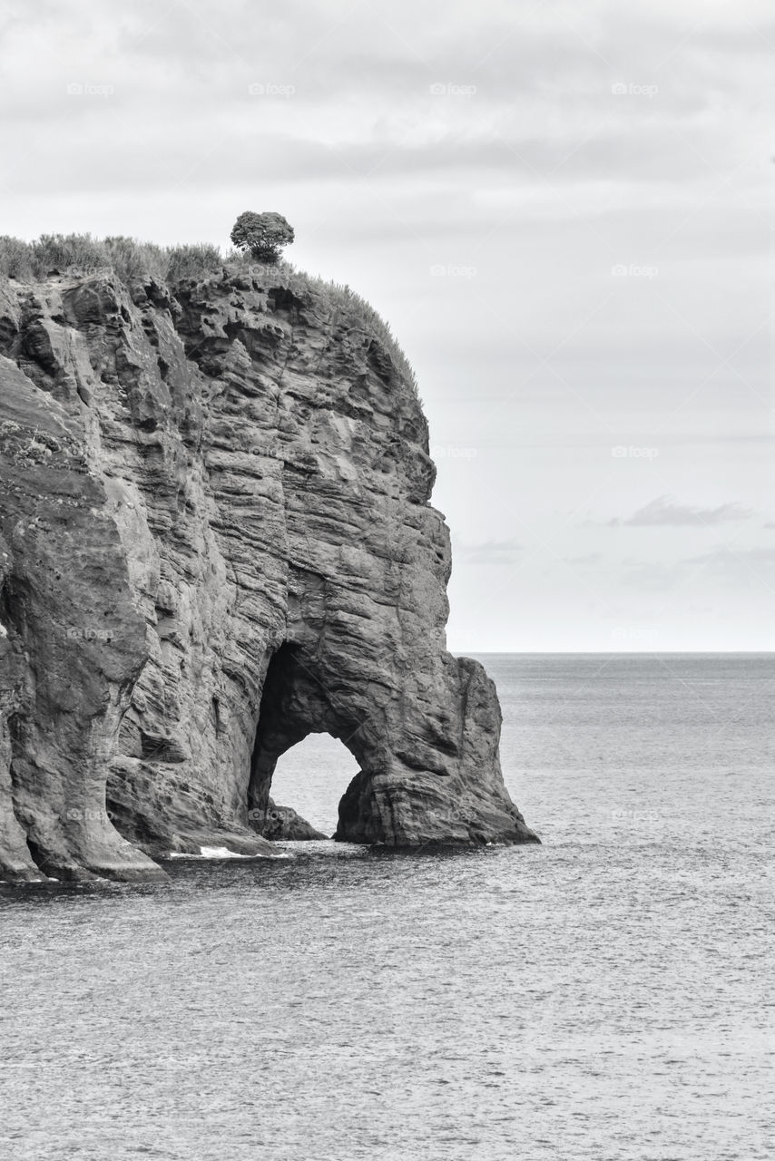 High angle view of cliff in sea