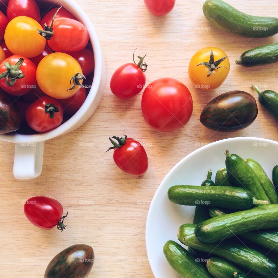 Cherry tomatoes and cucumbers