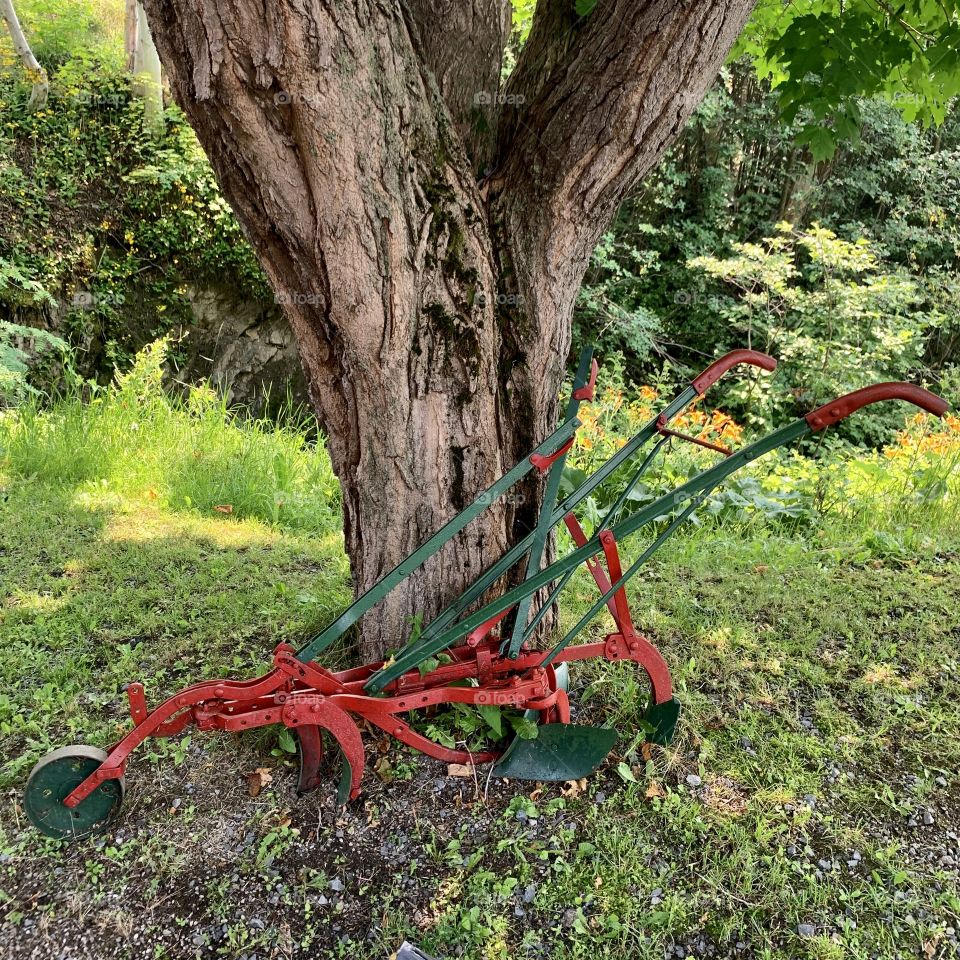 Ancient machinery that was used at the time to work the fields, Moulins de L’Isle-aux-Coudres, Quebec, Canada 