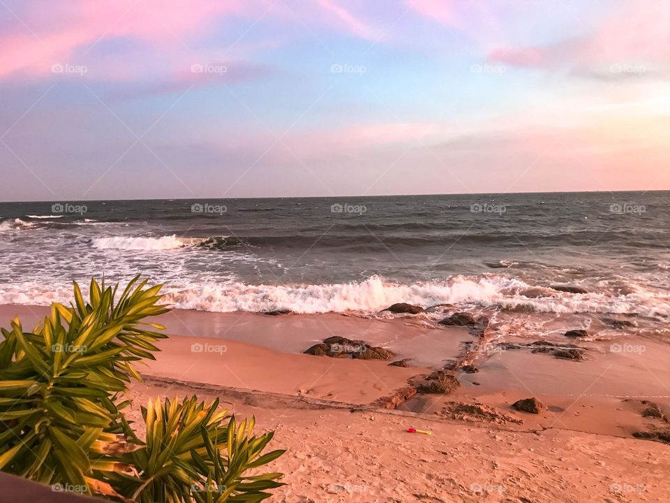 Sunset on the sea , I love looking at the colors of the sunset , I sat at a beachside restaurant and enjoy it.