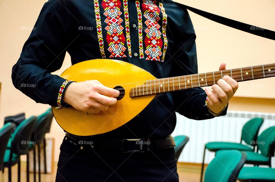 Playing An Instrument, the Bulgarian tambura