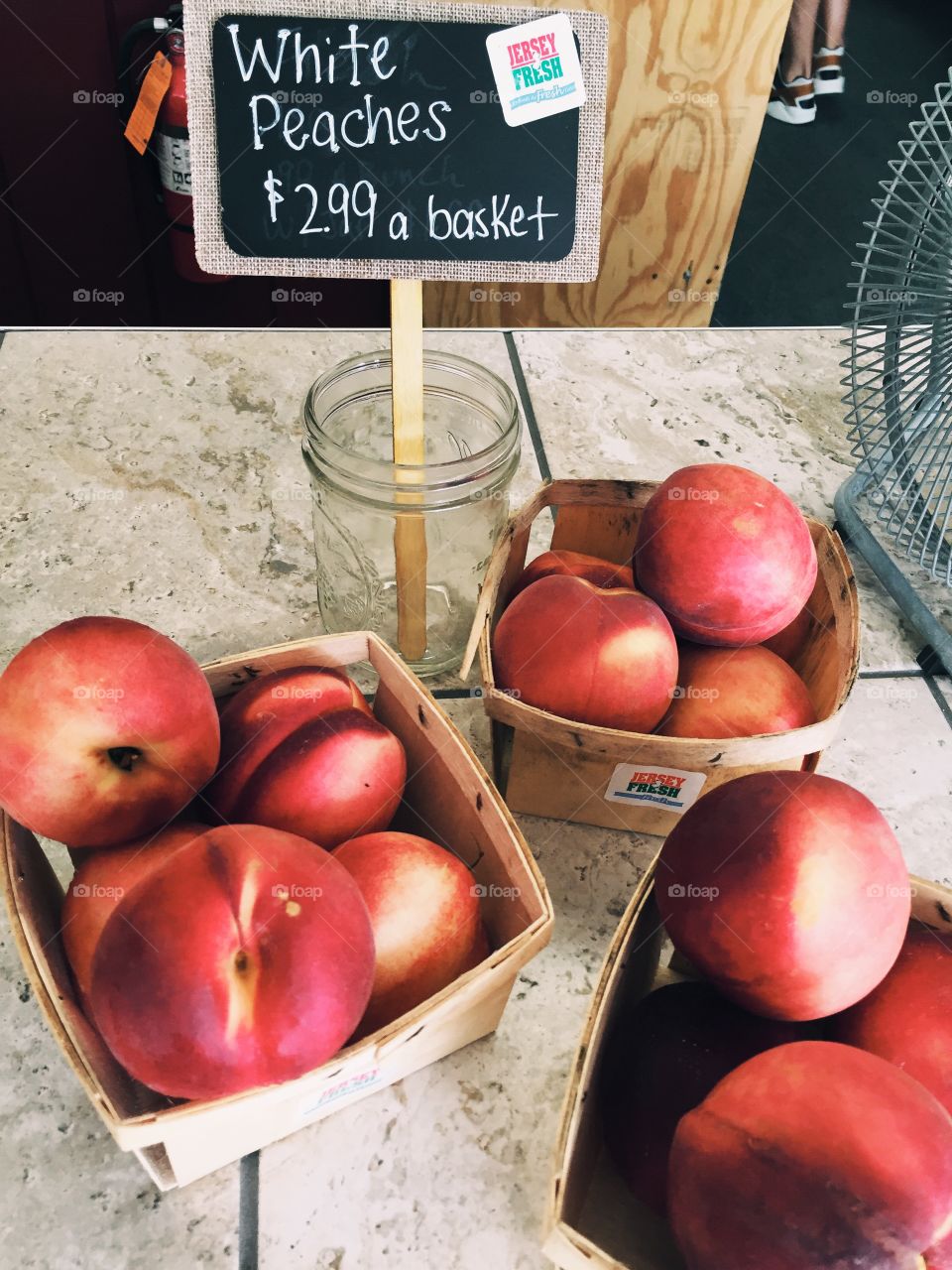 Baskets of fresh peaches