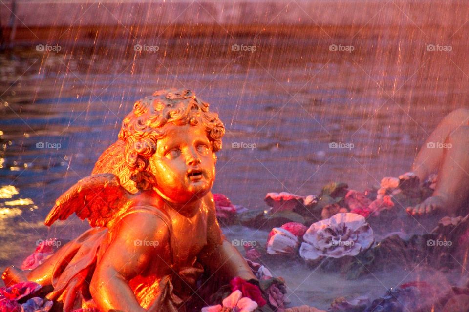 statue of a person in a garden