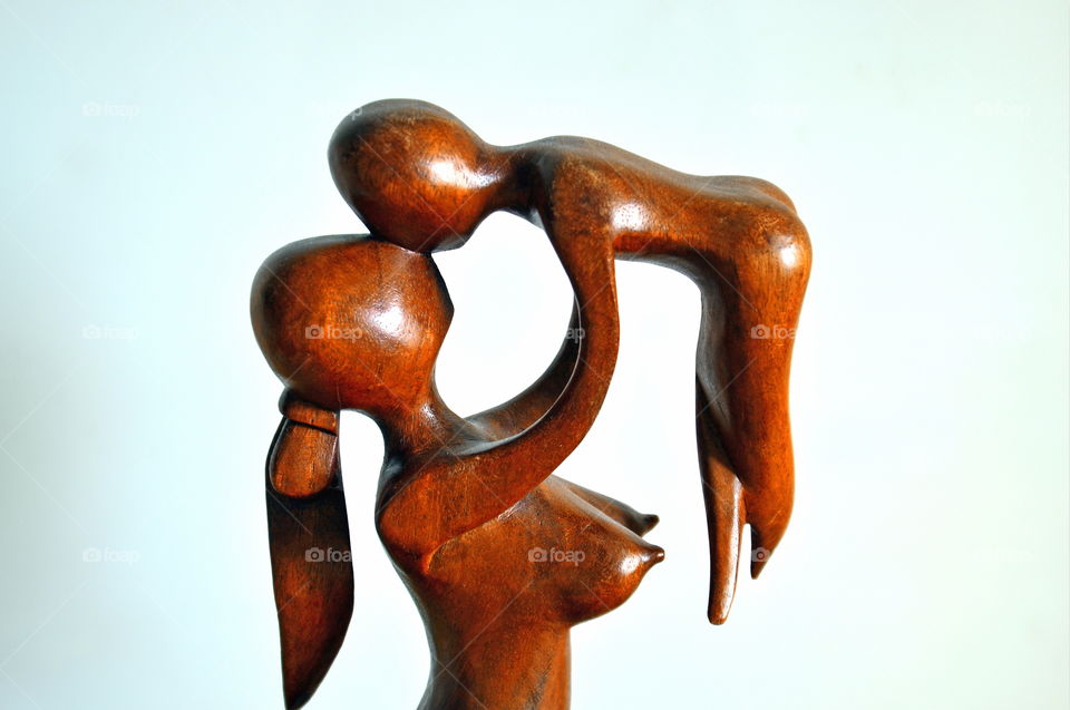 wooden sculpture, woman with child