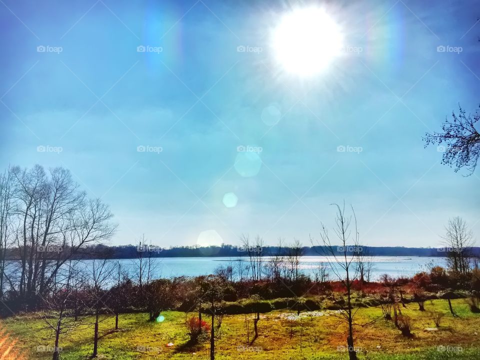 The sun shines over the water at Otter Point Creek in Abingdon, Maryland. 