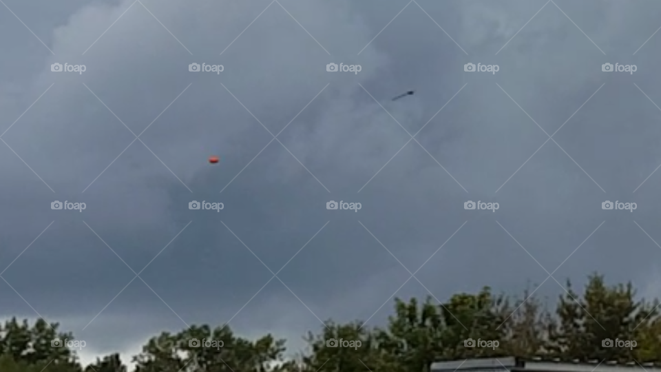 amazing shot with a bow and arrow at a clay pigeon in mid air