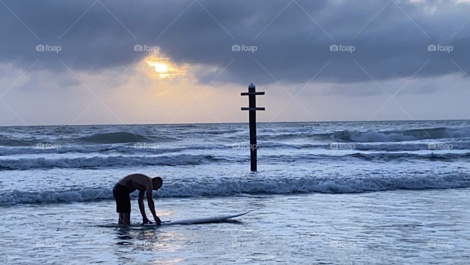 Surfer preparing to go