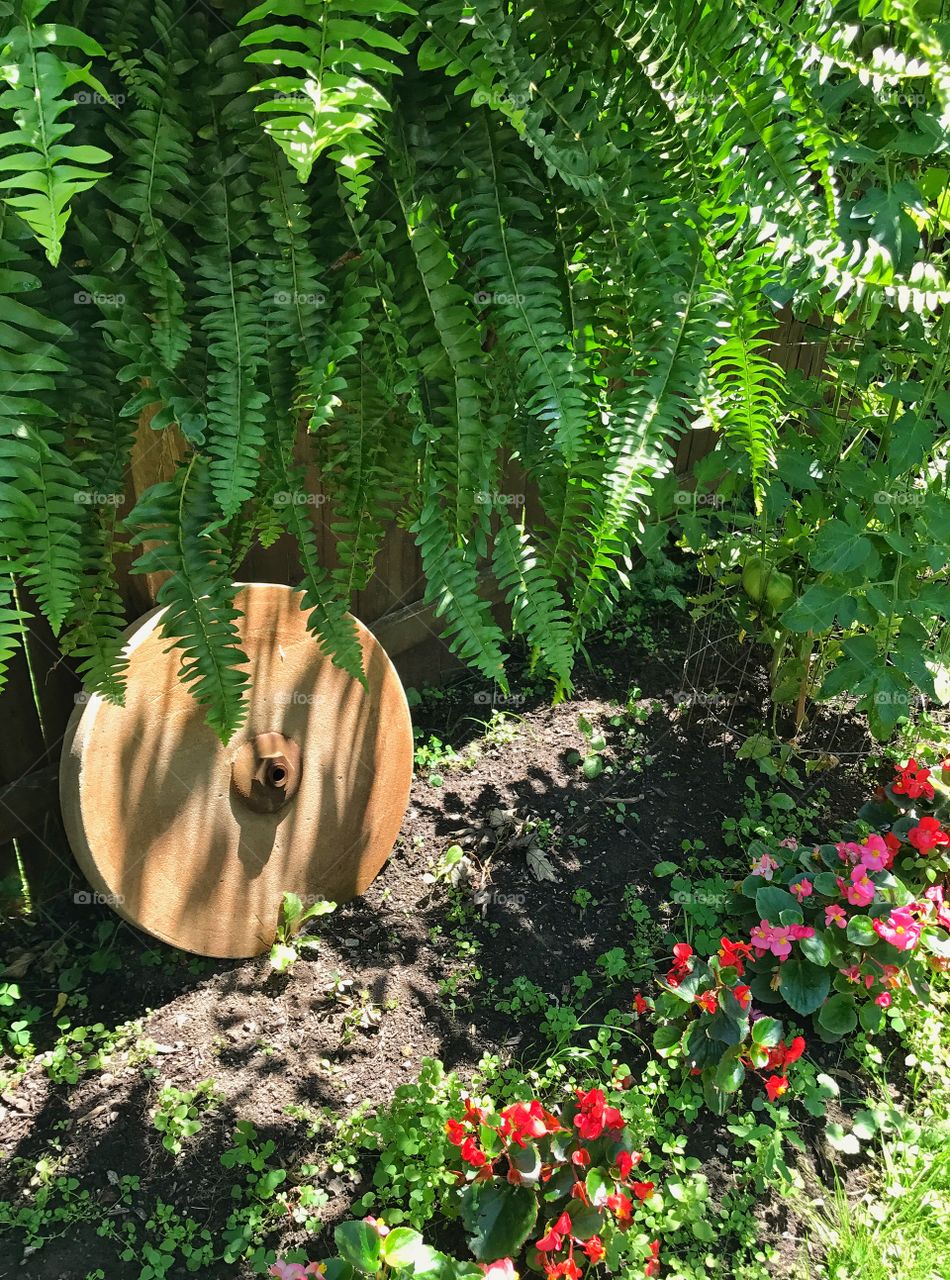 Grinding stone in garden