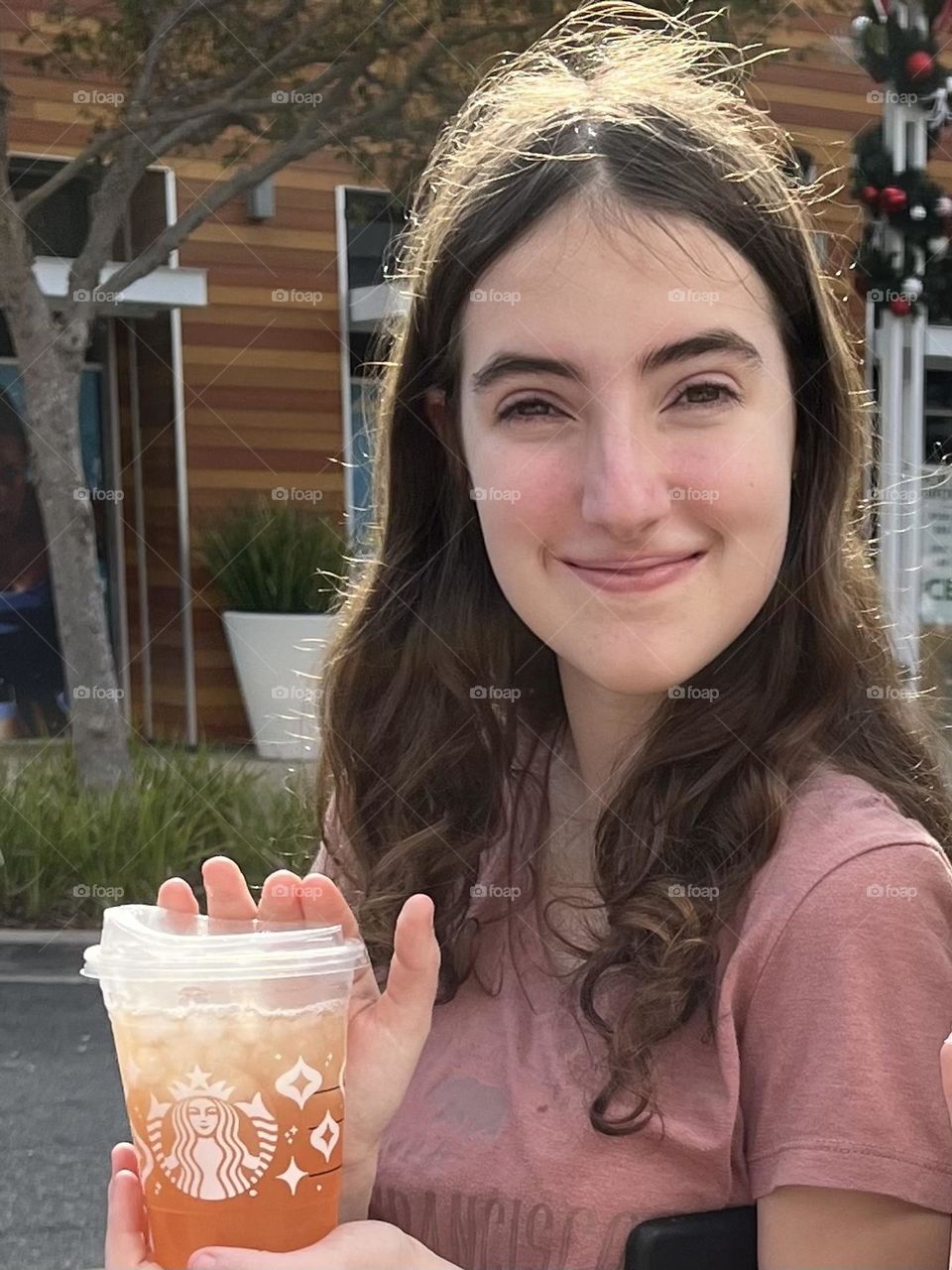 The joy of a specialty iced drink from Starbucks to make a preteen feel like an adult.