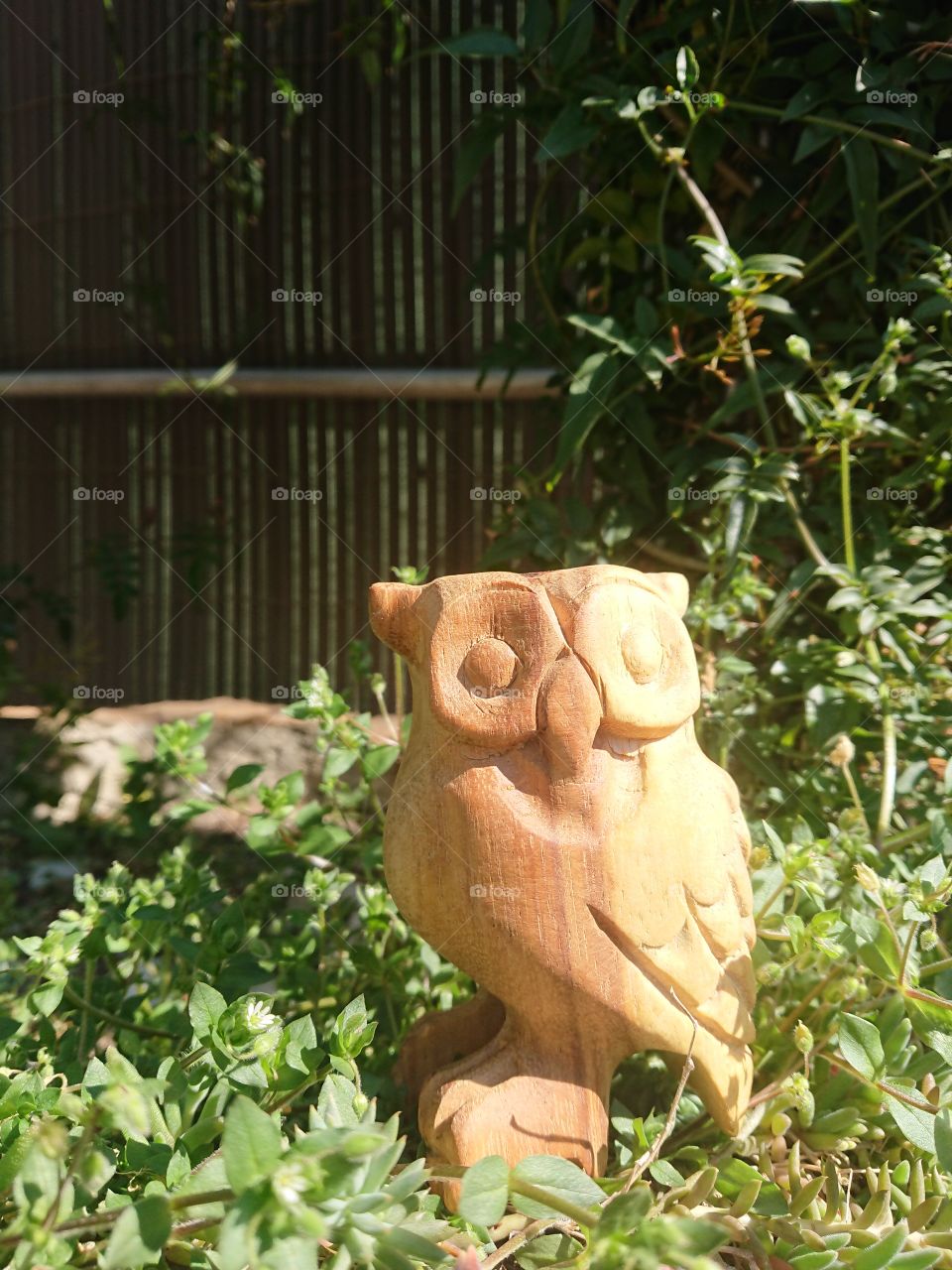 artistic wooden owl on plants, natural, outside home, garden, fantasy 2