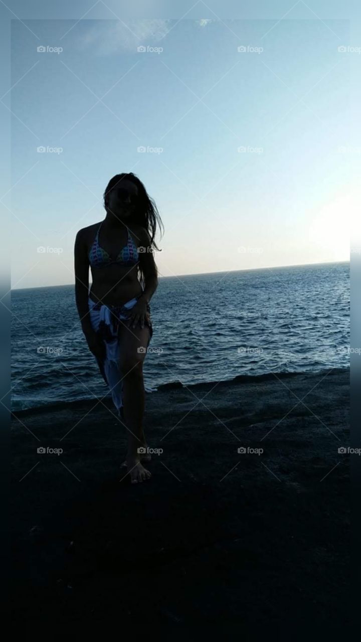 sombra em pôr do sol