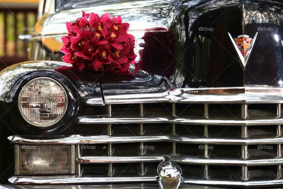 Vintage Cadillac limo and flower bouquet