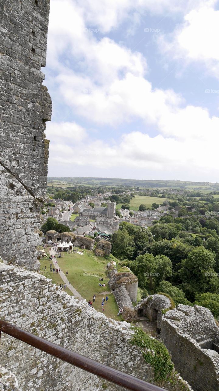 Village and castle ruins on countryside 