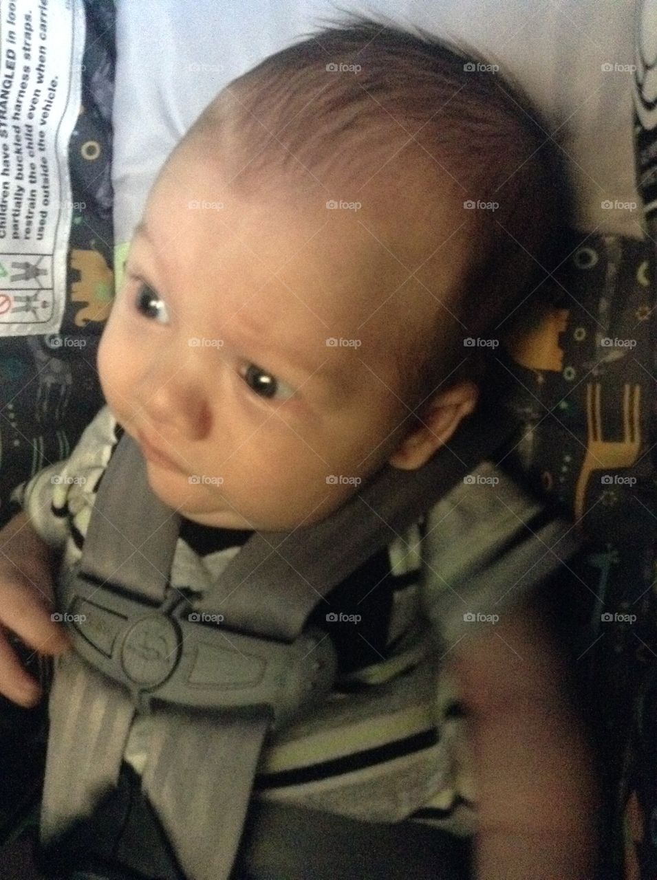 Zeke's face in his first car wash at 2 months old X)