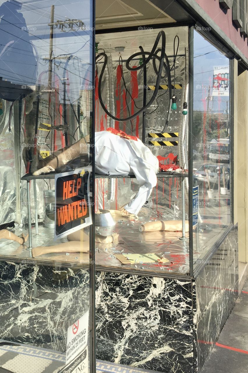 Halloween store showcase with murder scene 