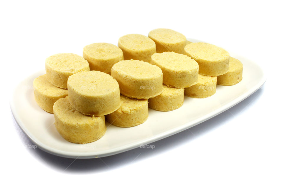 Polvoron, sweet Philippine delicacy made of fried flour, powdered milk, white refined sugar, butter flavorings add on for different tastes.