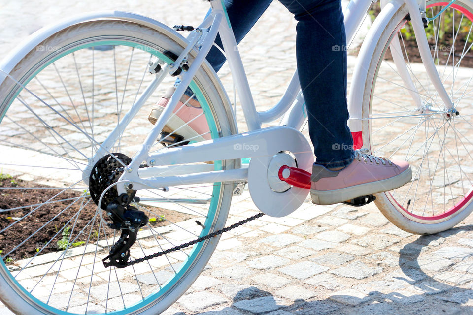 Riding bicycle, close up