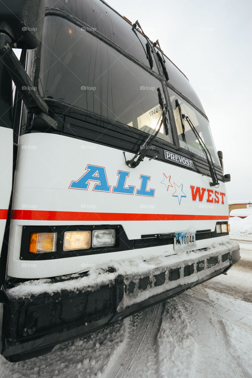 Greyhound bus in winter season at a stop 