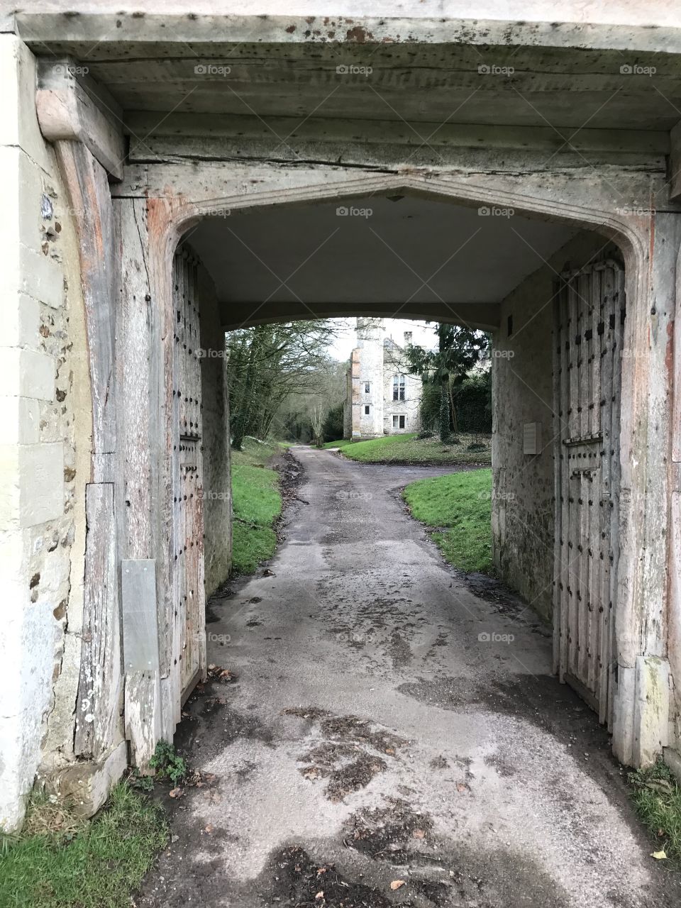 Tiny entrance tunnel of Shute Barton Estate, in Shute, Devon, UK