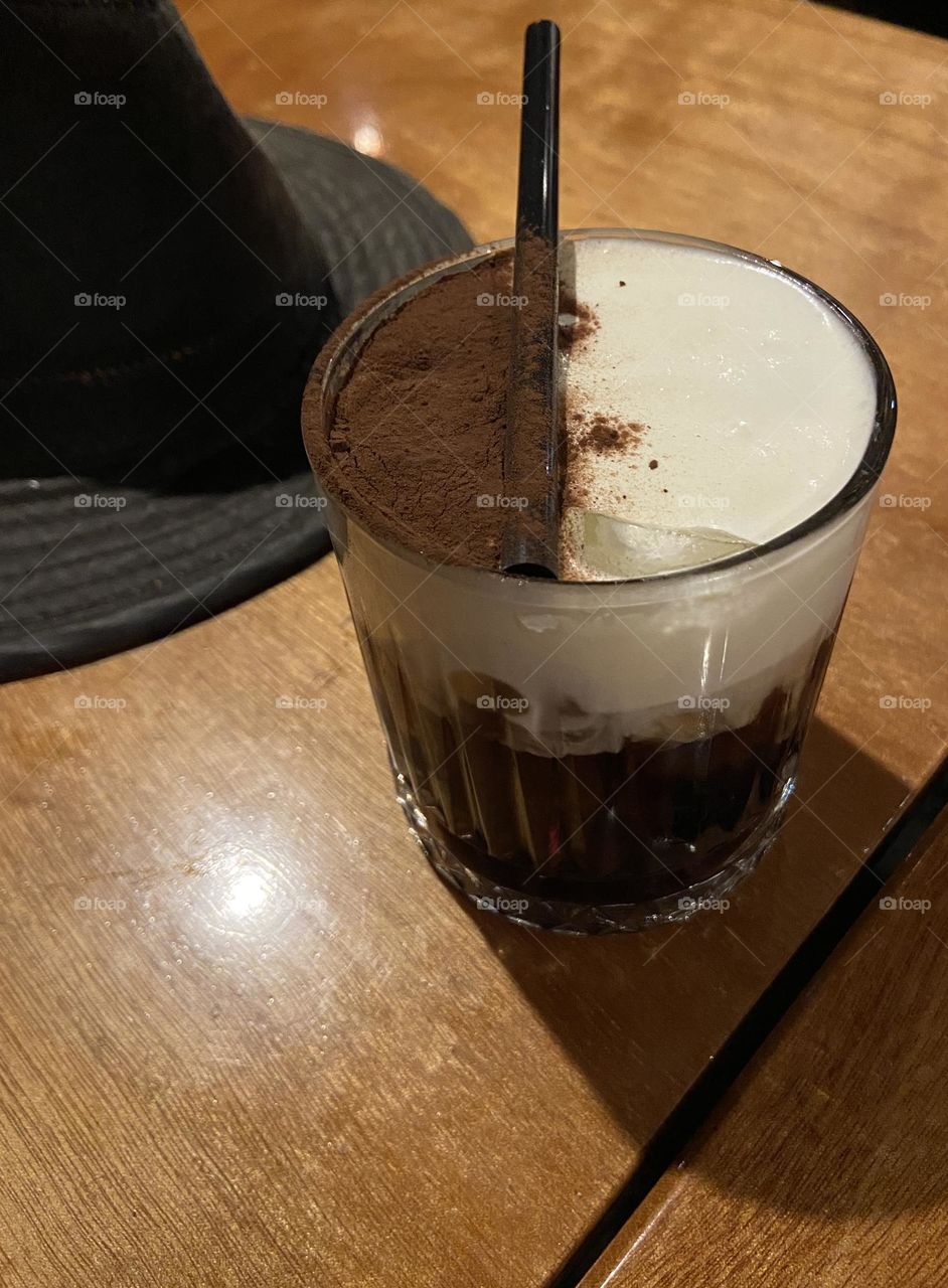 Coffee drink on the table with hat