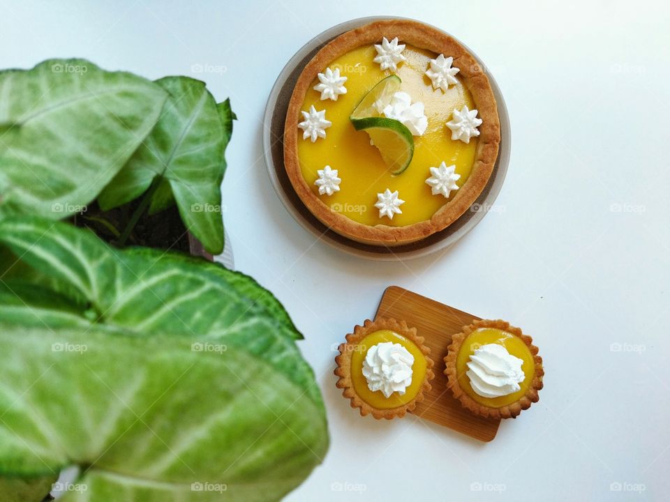 Classic lemon pie on white background.