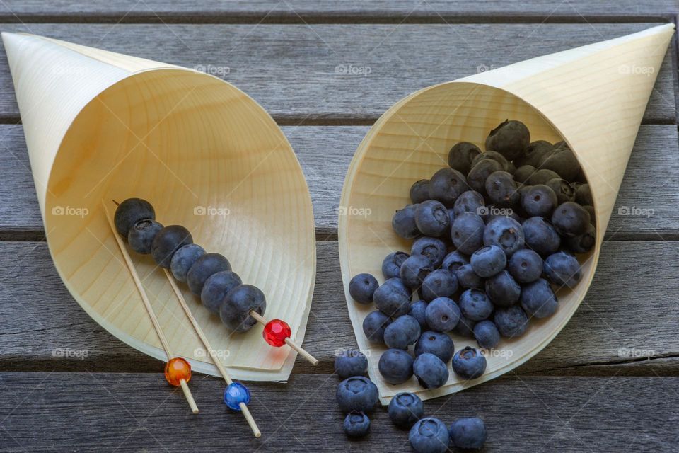 wood bags and blueberries