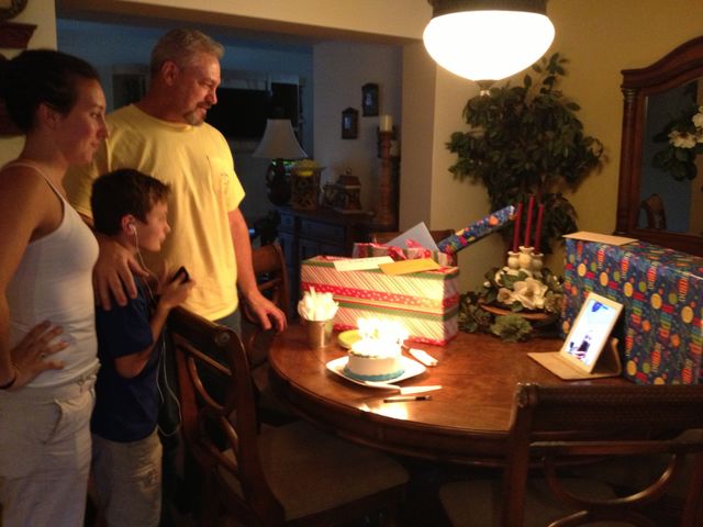 Parents celebrating their son's birthday