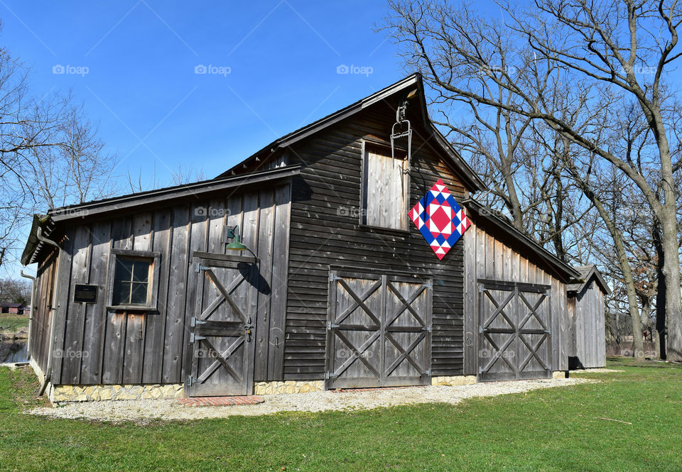 Rustic barn with Amish quilt