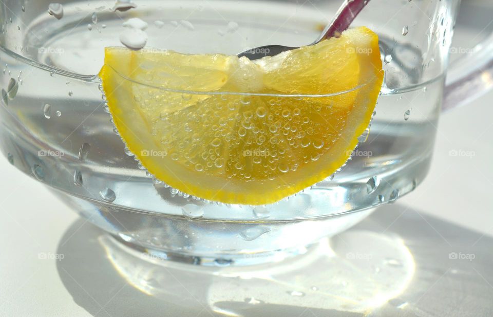 water with lemon close up