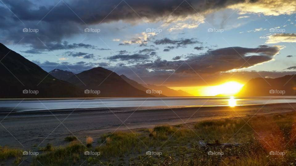 Remote Alaskan beach sunset.