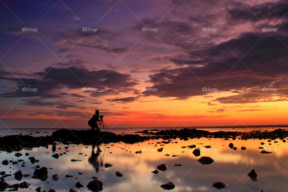 Sunset hunter at Batakan beach, South Borneo, Indonesia.