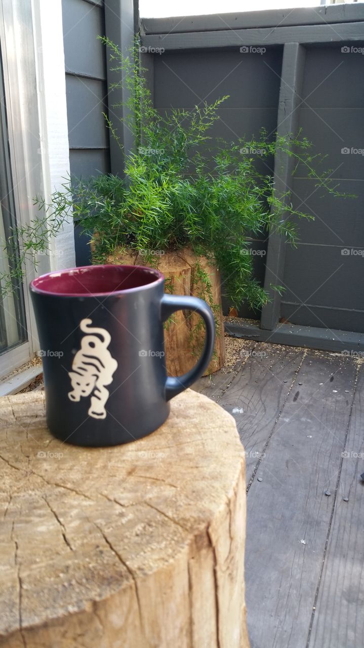 morning coffee. enjoying a cup of Joe outdoors