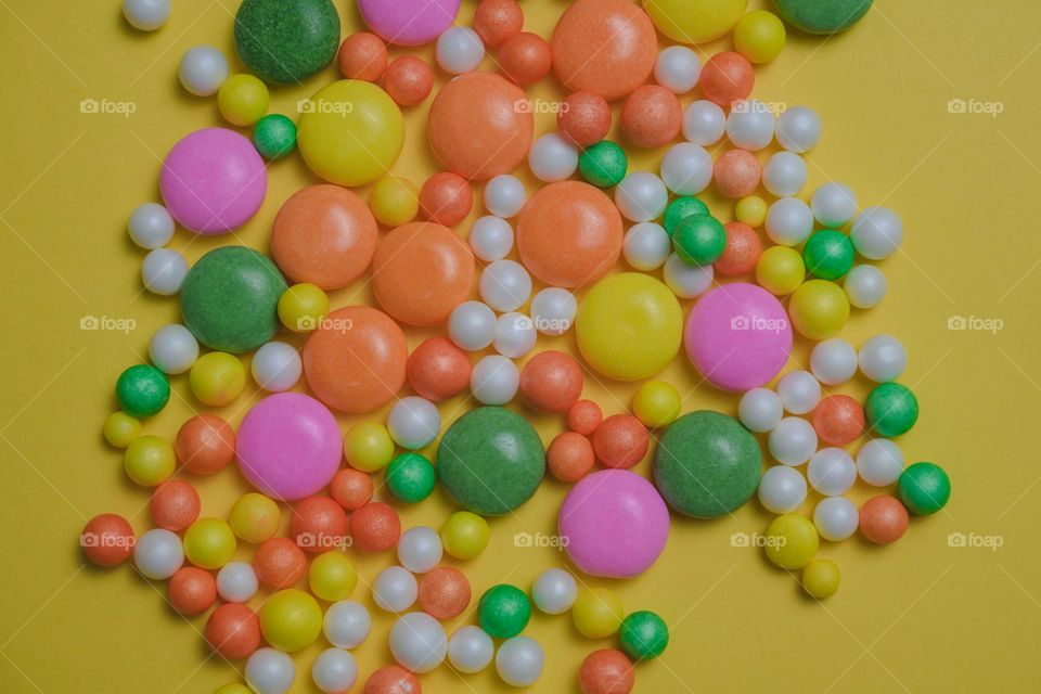 A mix of sweet colorful candy balls and gums.