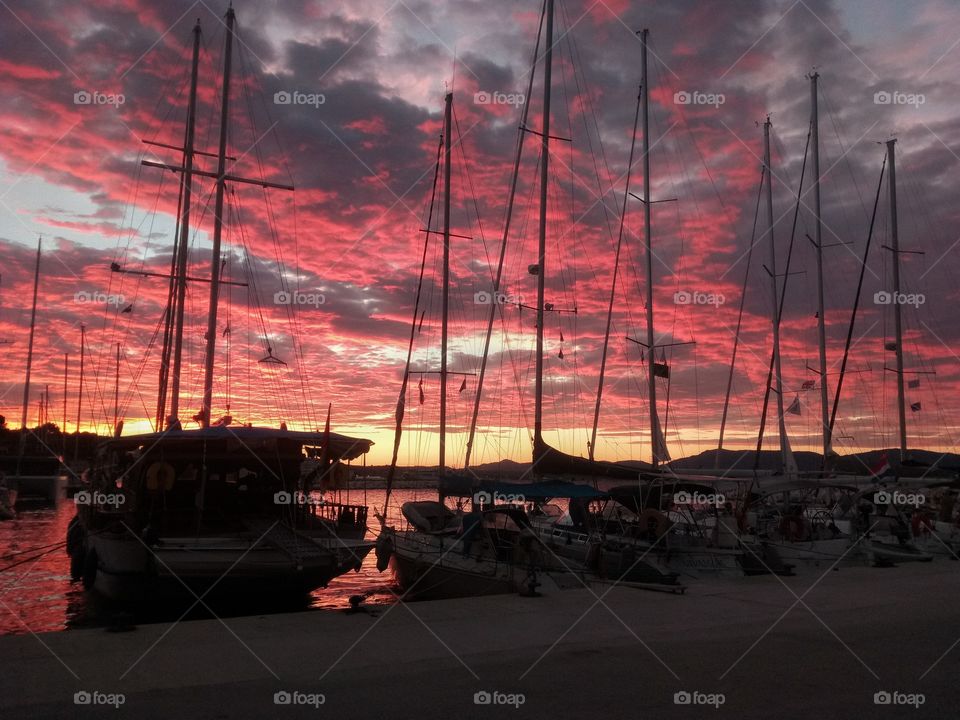 Corfu-Greece. Sailing boats in Mediterranean sunset