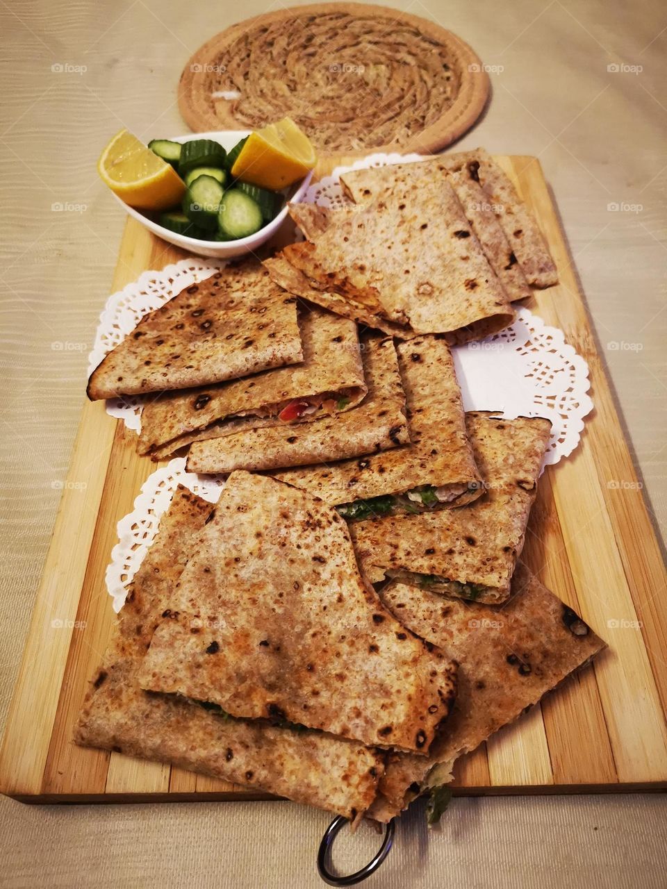 Flour chips with meat, vegetables and a little salad