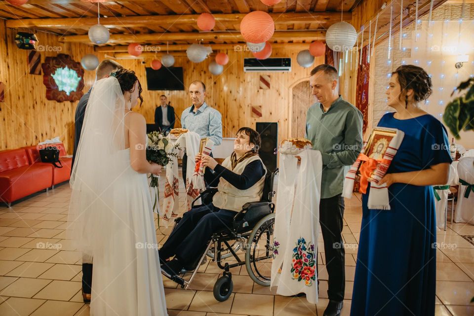 Blessing of the bride and groom with icons