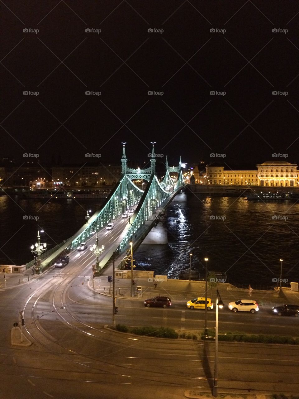 Nighttime bridge across Danube in Budapest 