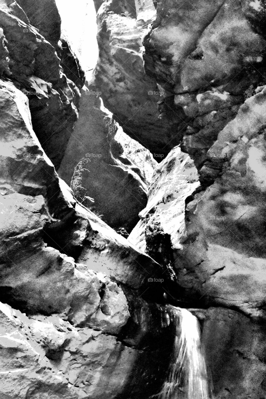 rocks water black and white monochrome rugged