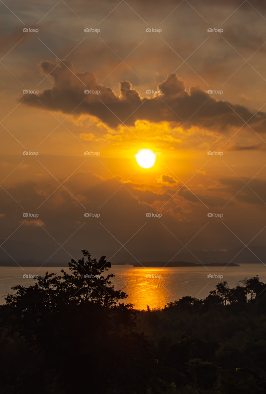 sunrise over Si Nakharin dam at Huay Mae khamin waterfall Nation