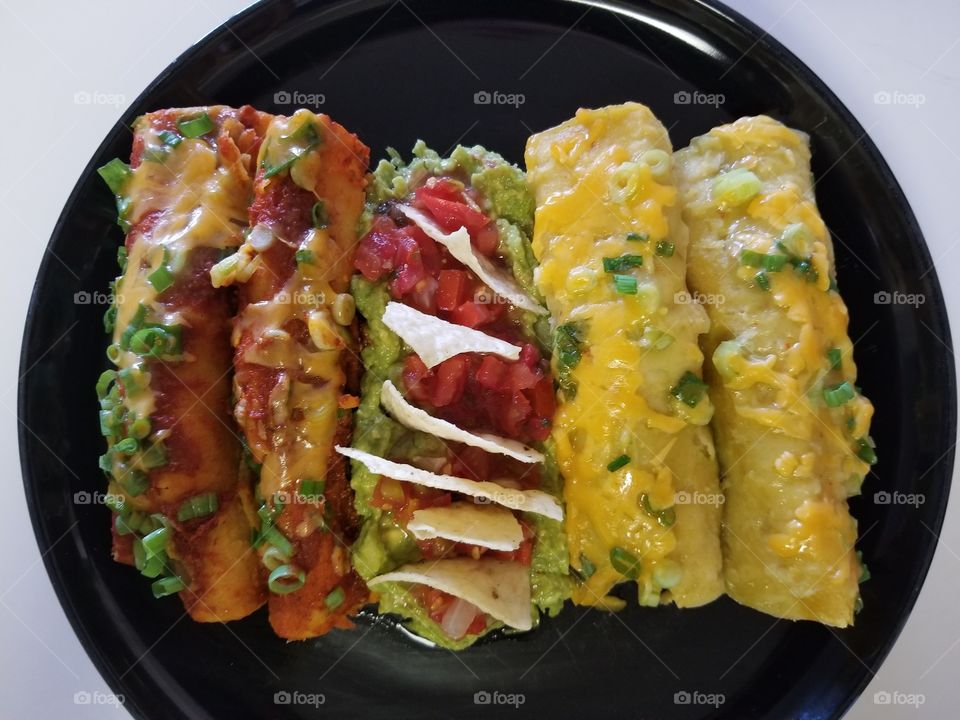 Red & Green Sauced Chicken Enchiladas w/ Homemade Guacamole

When you just can't decide what flavor to excite your mouth with!