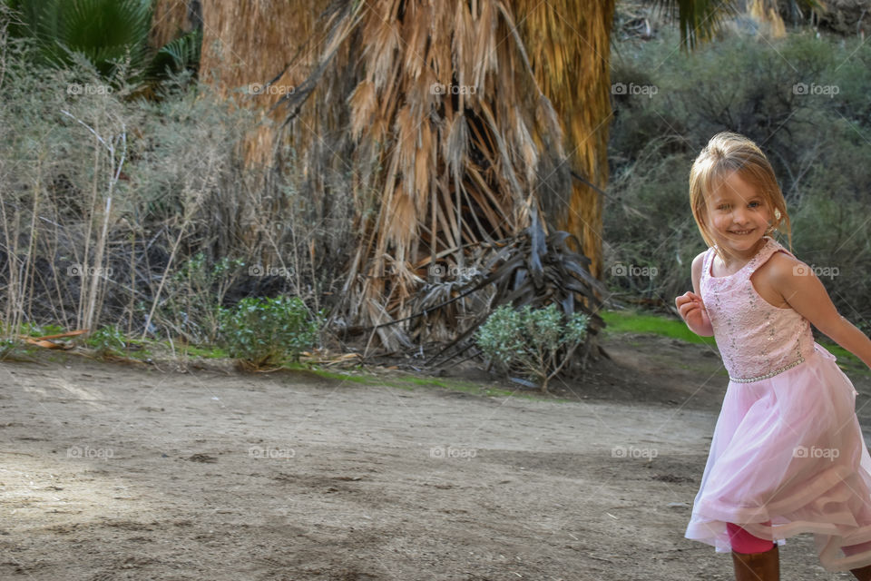running girl in pink dress